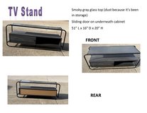 Glass-topped TV stand in Fort Leonard Wood, Missouri