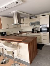 Modern fitted Kitchen with Kitchen Island in Ramstein, Germany