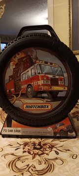 Matchbox case with 23 cars and trucks inside in Fort Polk, Louisiana