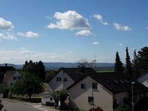 Spacious two-level apartment with 4 bedrooms and a beautiful view looking out to the Swabian Alp in Stuttgart, GE