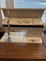 Singer sewing Machine 1036 in cabinet in Kingwood, Texas
