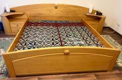 German solid wooden bed frame with integrated nightstands in Ramstein, Germany