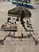 Matthew’s bow and equipment in Fort Polk, Louisiana