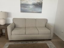 Beige gray sofa in Aurora, Illinois