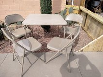 Folding table and 4 folding chairs in Alamogordo, New Mexico