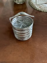 silver and glass coasters on stand in Spring, Texas