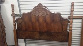 Traditional Brown Wood Bed Frame with Carvings in Kingwood, Texas