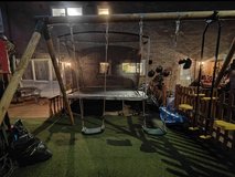 triple swing set in Lakenheath, UK