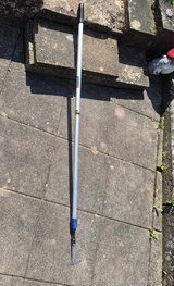 Weed scraper in Ramstein, Germany