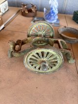 antique cast iron cart and child in Alamogordo, New Mexico