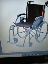 Feather Mobility ultra lite weight 13.5 LB. Wheelchair new in box. never used in Joliet, Illinois