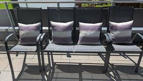 Two outdoor chairs and a two seater bench in Stuttgart, GE
