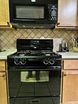 Black Gas Stove & Over-the-Range Microwave Set in Perry, Georgia