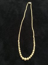 Faux white pearl necklace in Chicago, Illinois
