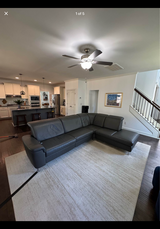 High-Quality German-Made Gray Leather Reclining Sofa in Sanford, North Carolina