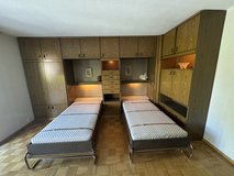 A wall unit from the brand Nehl, featuring 2 fold-out beds, a desk, a wardrobe, and a shelf unit... in Wiesbaden, GE