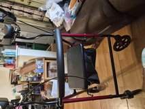 Tall walker with the seat in Wheaton, Illinois