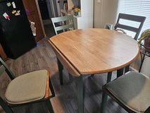 Table w/4 chairs drop leaf in Perry, Georgia