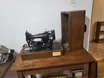 Antique 1951 Singer Sewing Machine and table in Chicago, Illinois