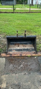 excavator ditching bucket in Houston, Texas