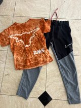 Nike pants & Longhorn tee in Houston, Texas