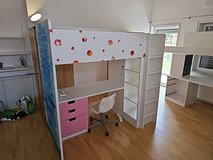 Ikea loft bed with mattress and chair in Ramstein, Germany