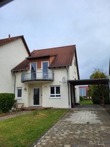 Semi-Detached House with Carport in Weilerbach in Ramstein, Germany