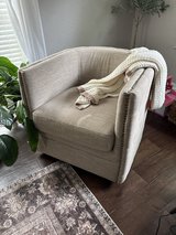 Like new fabric swivel tufted chair in Kingwood, Texas
