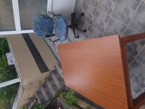 Free wooden office table and chair in Ramstein, Germany