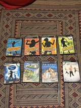 Assortment of US PS2 Karaoke, Golf, Trivia, and Exercise games in Stuttgart, GE