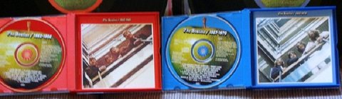 red and blue collection of beatles cd's in Westmont, Illinois