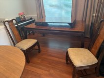 Neo Oriental dining room table with six chairs in Houston, Texas