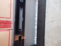Fireplace tv stand with multi color flame in Fairfield, California