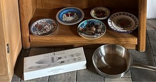 Decorative plates, crystal handle wedding cake knife and shove, and frying pan in Ramstein, Germany
