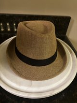 Tan Straw Fedora Beach Hat with Black Band in Chicago, Illinois