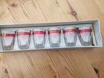 Vintage set of 6 French shot glasses, 1950s-1970s, cranberry red band, and gold rim in Lakenheath, UK