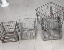 4 old metal milk crates in Bolingbrook, Illinois