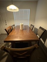 Solid wooden table with chairs in Houston, Texas