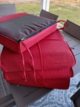 4 red outdoor chair cushions in Alamogordo, New Mexico