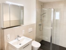 Brand New modern Apartments in a green backyard oasis in historic downtown in Grafenwoehr, GE