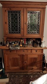 Antique cabinet with bulleye glass panes in Ramstein, Germany