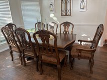 Dining table, 8 chairs, two extension leafs and buffet hutch in Houston, Texas