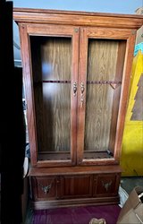 wooden gun cabinet w double doors, missing glass in Fort Polk, Louisiana