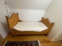 Antique rustic single bed frame and full size American box spring and mattress in Ramstein, Germany