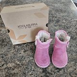 Toddler pink suede boots by UGG in Batavia, Illinois