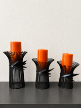 3 Metal Candle Holders with Candles in Alamogordo, New Mexico