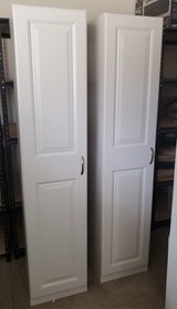 2 White Wooden Single Door Utility Cabinets in Alamogordo, New Mexico