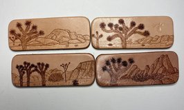 Fridge magnets pyrography on leather in 29 Palms, California