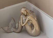 Gold Mermaid status in Kingwood, Texas