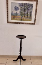 Selling a dark brown plant stand in Stuttgart, GE